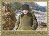 Colnect-3266-468-Kim-Il-Sung-with-fur-hat-in-winter-landscape.jpg