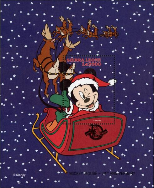 Colnect-7458-815-Mickey-on-a-Sledge-with-logo---text--Happy-Birthday-1998-.jpg
