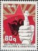 Colnect-1454-459-Red-Star-Fist-with-Gun-Barrel-and-Albanian-Flag.jpg