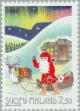 Colnect-160-539-Santa-Claus-with-sledge-in-front-of-a-house.jpg