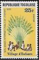 Colnect-5528-308-Children-sitting-under-African-fan-palm.jpg