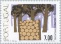 Colnect-173-881-Trees-and-logs.jpg