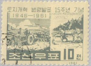 Colnect-2598-331-Tractor-and-Plow.jpg