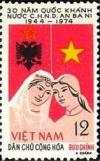 Colnect-1623-718-National-Flags-Woman-from-Albania-und-Vietnam.jpg