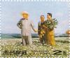 Colnect-3259-637-Kim-Il-Sung-with-farm-workers-in-the-potato-field-Painting-.jpg