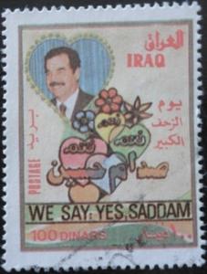 Colnect-1591-371-Saddam-Hussein-1937-2006-president--flowers-and-hearts.jpg