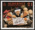 Colnect-5223-118-Wombles-around-map-of-Alderney.jpg