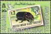 Colnect-1553-575-Former-Issue-on-Stamp-Coconut-Rhinoceros-Beetle-Oryctes-rh.jpg