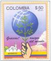Colnect-2498-418-Globe-with-hand-branch-town-volcano.jpg
