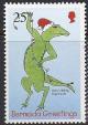 Colnect-1340-153-Lizard-in-Santa-hat-stringing-Christmas-lights.jpg