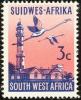 Colnect-5480-567-Swakopmund-Lighthouse-Lesser-Flamingo-Phoeniconaias-minor.jpg