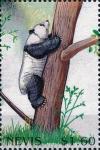 Colnect-4411-448-Giant-Panda-climbing-trunk.jpg
