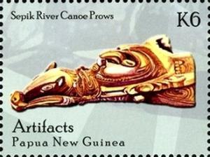 Colnect-2553-242-Sepik-River-canoe-prow-carved-with-animal--s-head.jpg