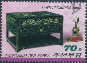 Colnect-3268-632-Table-with-mother-of-Pearl-inlay-rubbing-stone-and-brush.jpg