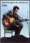 Colnect-2229-854-Elvis-Sitting-with-Guitar.jpg