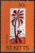 Colnect-5008-707--Man-Under-Coconut-Tree-.jpg