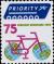 Colnect-717-359-Bicycle-with-globes-as-wheels.jpg