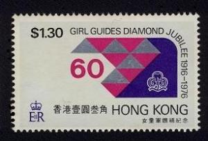 Colnect-1893-306--ldquo-60-rdquo--tents-and-Girl-Guides-emblem.jpg
